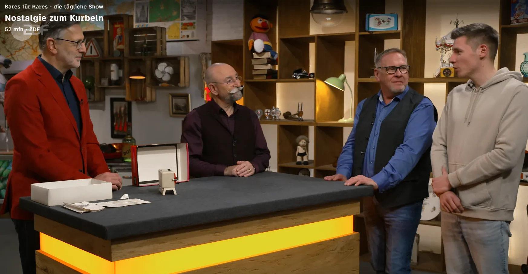 Szene aus Bares für Rares mit Horst Lichter, Siegmar und Jan Stücher